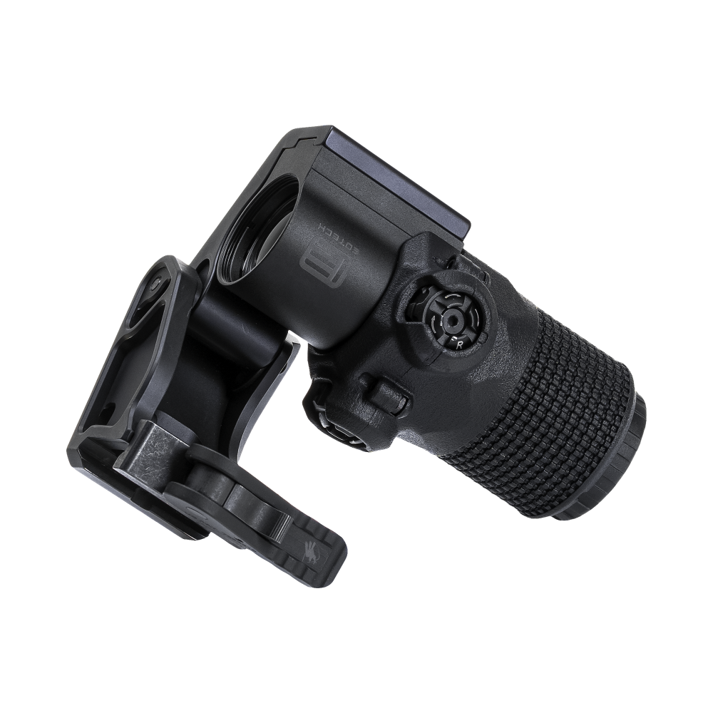 EOTech G33 magnifier with HRF Concepts AMC Armored Magnifier Cover in black, featuring a rugged knurled design for enhanced protection and grip, mounted on a Unity Tactical FTC (Flip-to-Center) magnifier mount for AR-15 optics setups