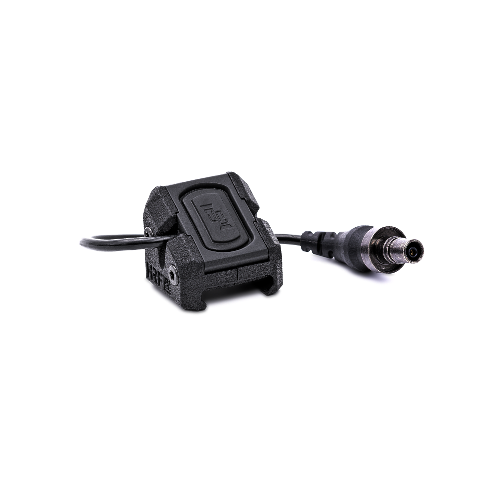 ODG RAMP mounted on a surface with a cable attached, in a black color, designed as an ergonomic mounting solution for Modlite ModButton Lite switch.